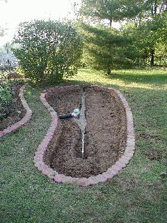 The ground is prepared for a residential rain garden in Monroe County.